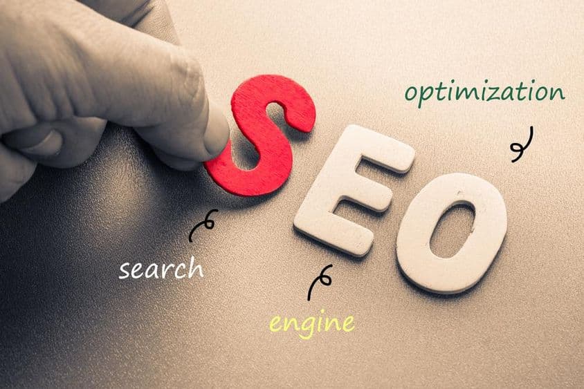 Wooden letters spelling out the SEO acronym (Search Engine Optimization).